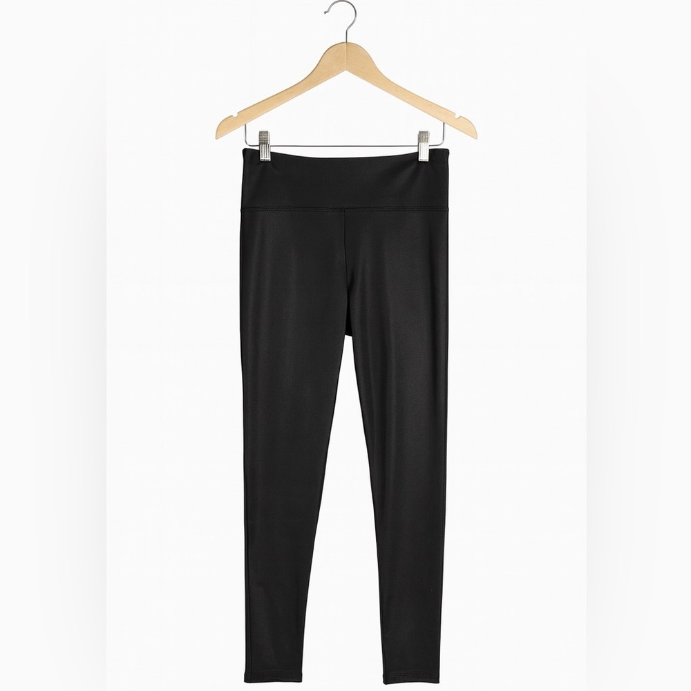 JoyLab size medium black sparkly leggings with pocket for essentials.